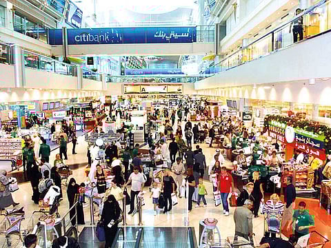 Travellers at Dubai International Airport