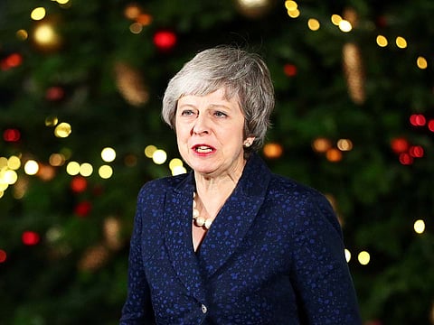 Britain's Prime Minister Theresa May speaks outside 10 Downing Street after a confidence vote by Conservative Party Members of Parliament (MPs), in London, Britain December 12, 2018.