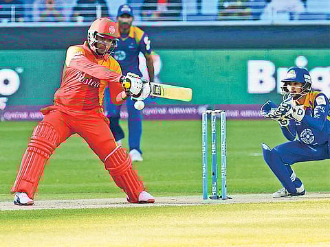 A file photo of Sharjeel Khan of Islamabad United playing shot against Karachi Kings during the Pakistan Super League at Dubai International Cricket Stadium.