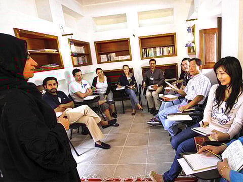 Students at the Shaikh Mohammad Centre for Cultural Understanding (SMCCU), Dubai, during a new class on the UAE Arabic dialect from Shuaa Zainal, the English teacher who teaches Emirati Dialect.