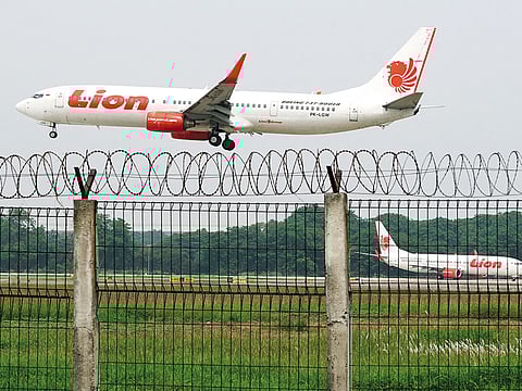 A Lion Air Boeing aircraft prepares to land at Soekarno- Hatta International Airport in Cengkareng, near Jakarta, Indonesia.