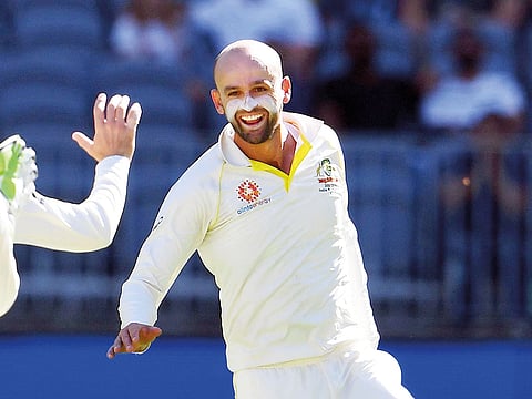 Lyon celebrates Kohli’s wicket.