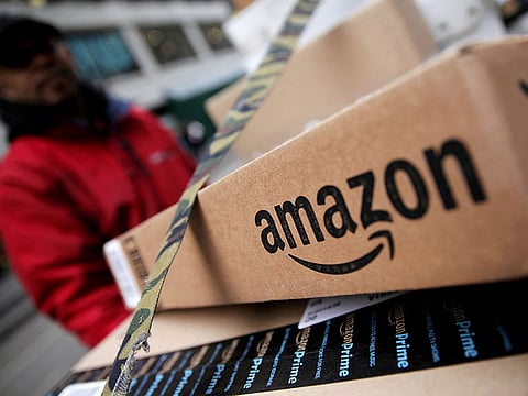 Amazon is facing criticism from lawmakers, workers and activists for not doing enough to protect hourly workers on the front lines of the crisis.