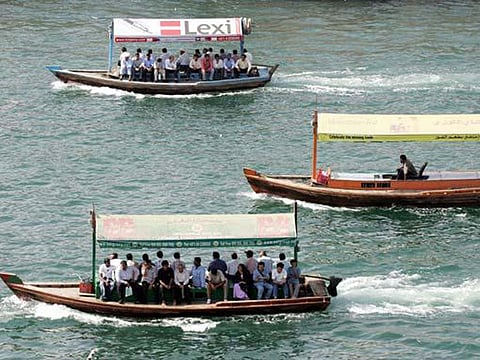 Abras cross the Dubai Creek.