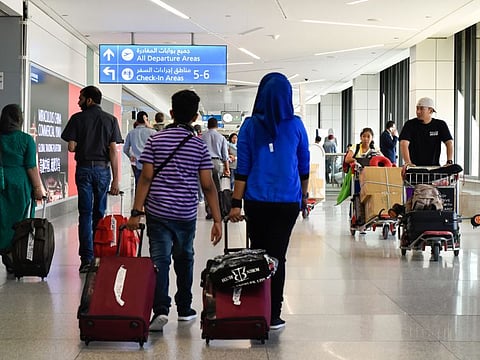 Passengers at Dubai International Airport.