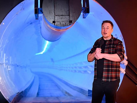 Elon Musk, co-founder and chief executive officer of Tesla Inc., speaks during an unveiling event for the Boring Company Hawthorne test tunnel in Hawthorne, south of Los Angeles, California on December 18, 2018.
