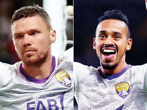 Al Ain’s Marcus Berg (left) and Caio