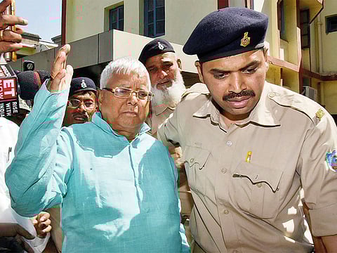 A file photo of former Bihar chief minister Lalu Prasad Yadav as he leaves the special CBI court after being pronounced guilty in the fourth Duma multi-crore fodder scam case, in Ranchi.