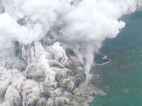 A plume of ash rises as Anak Krakatau erupts in Indonesia, December 23, 2018, in this still image taken from a video obtained from social media.