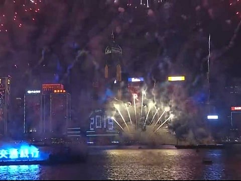Fireworks light up the sky above Hong Kong for New Year