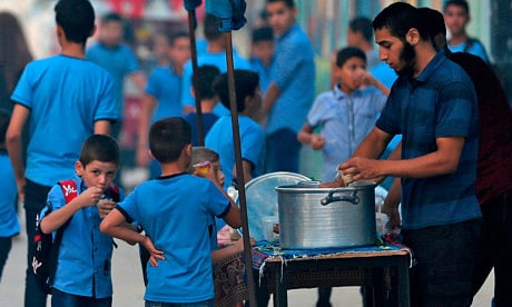 Pupils outside a school run by the UNRWA in Gaza City after the summer holidays.