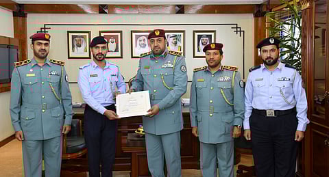 Policeman jumps into sea in his uniform to save drowning man in Sharjah