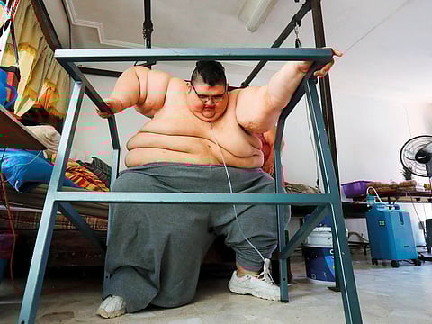 Mexican Juan Pedro Franco, tries to stand up at his house in Guadalajara, Jalisco state, Mexico.