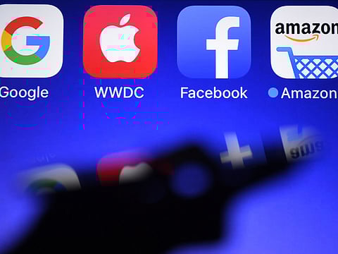 The connectivity bandwagon needs to make a move on homes. Even now, most devices operate in standalone format, and that's what Internet of Things will need to change. File picture shows a smartphone being operated in front of GAFA logos (acronym for Google, Apple, Facebook and Amazon).