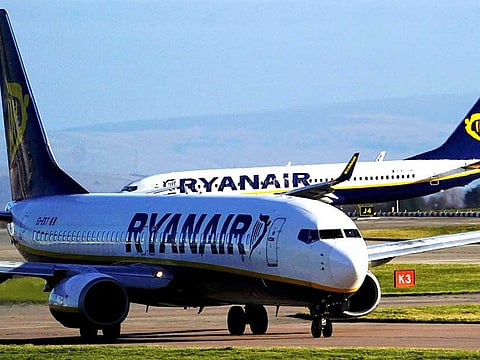 Ryanair Boeing 737-800 aircraft taxi at Manchester Airport, Britain. Europe's biggest airline Ryanair and Manchester Airports Group on Thursday launched legal action to try to get the UK government to ease travel rules.