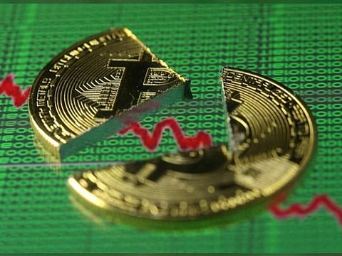 Bitcoin slumped to a two-week low, with some analysts pointing to the recovery of Colonial Pipeline Co.'s ransom as evidence that crypto isn't beyond government control.