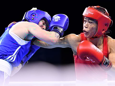 India’s Mary Kom (right) lands a punch on Northern Ireland’s Kristina O’Hara during their women’s 45-48kg final boxing match in the 2018 Gold Coast Commonwealth Games at Gold Coast on April 14. Kom, 35, outclassed her opponent to bag the gold.