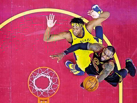 Cleveland Cavaliers’ LeBron James drives to the basket against Indiana Pacers’ Myles Turner in the first half of Game 5 of their first-round play-off series in Cleveland on Wednesday. The Cavaliers won 98-95.