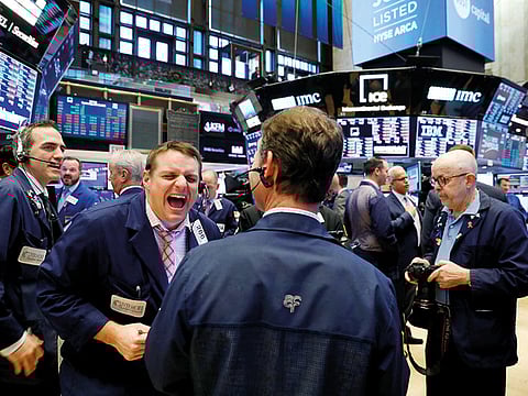 Traders at the New York Stock Exchange. With more companies worldwide reporting earnings in full swing, investors will keep an eye for how businesses are coping with the ongoing escalating crisis.