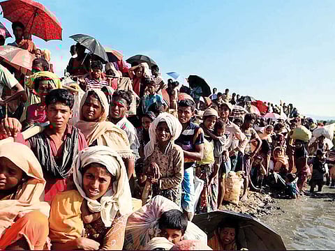 Rohingya Muslims from Myanmar proceed towards a refugee camp, at Anjuman Para, Ukhiya, Bangladesh.