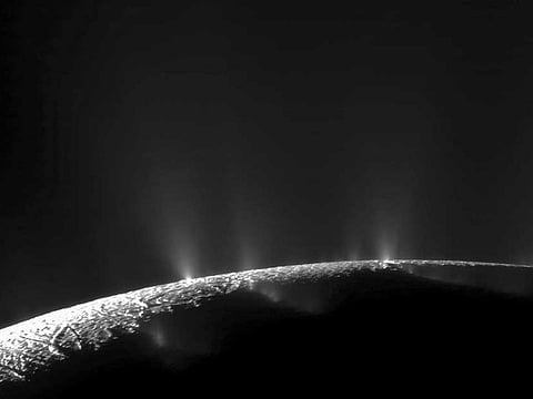 Just 500 kilometres (310 miles) wide and invisible to the naked eye, the white, scar-covered Enceladus is one of hundreds of moons orbiting the sixth planet from the Sun.