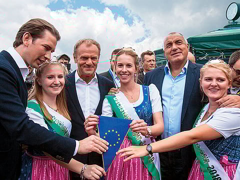 Sebastian Kurz (left), Donald Tusk (third left) and Bulgarian Prime Minister Boyko Borisov pose with a European flag in this file image