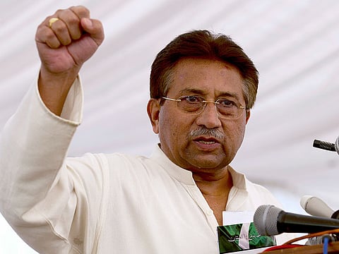 In this Monday, April 15, 2013 file photo, Pakistan's former President and military ruler Pervez Musharraf addresses his party supporters at his house in Islamabad, Pakistan.