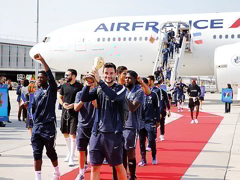 File photo: France's Hugo Lloris holds the trophy as the team return from the World Cup in Russia.