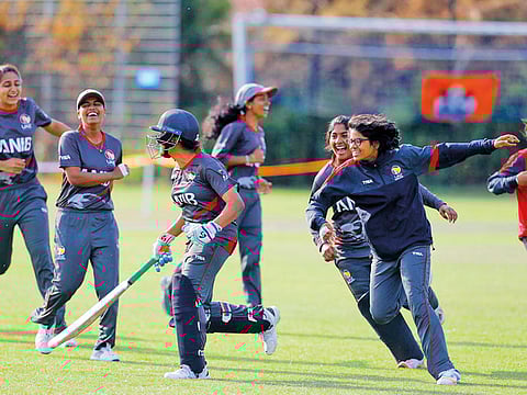 UAE women cricketers celebrate a victory over Netherlands.
