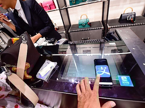 President Donald Trump signed an order banning US transactions with eight digital Chinese payment platforms including Ant Group Co.'s Alipay in 45 days.