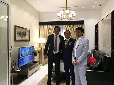 File picture of Danube Group top executives Atif Rahman (left), Rizwan Sajan and Anis Sajan at one of the developer's show apartments.