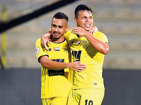 Al Wasl’s Fabio de Lima, right, celebrates.