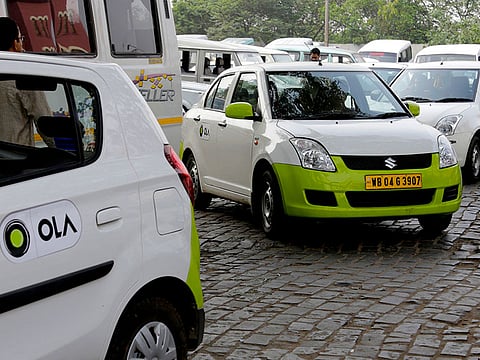 Ola cabs wait for customers in Kolkata, India. Aiming to wrest control of India’s booming taxi market, two cab-hailing smartphone apps, Uber and Ola, are promising hundreds of millions in new investments while also facing off with one another in court.