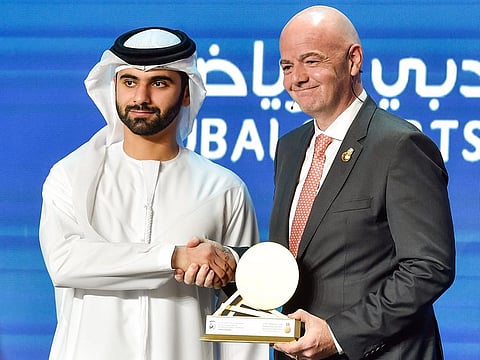 Shaikh Mansour Bin Mohammad Bin Rashid Al Maktoum presenting a momento to Fifa president, Gianni Infantino at the the Dubai International Sports Conference on Wednesday.