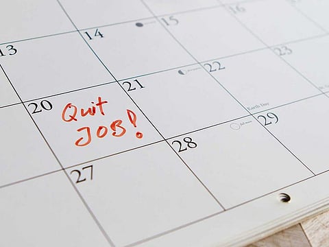 What are the legal repercussions of resigning from your job when you are not in the UAE.