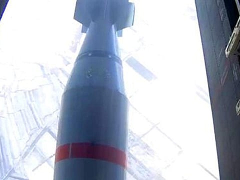 A massive aerial bomb is airdropped by an H-6K bomber and causes a gigantic explosion at an unknown location.