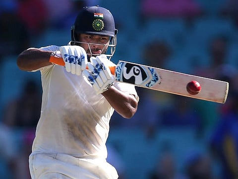 India's Rishabh Pant pulls a ball delivered by Australia's Josh Hazlewood on day 2 during their cricket test match in Sydney, Friday, Jan. 4, 2019.