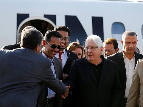 United Nations envoy to Yemen, Martin Griffiths (C), shakes hands with Houthi officials upon his arrival at Sanaa airport in Sanaa, Yemen January 5, 2019.