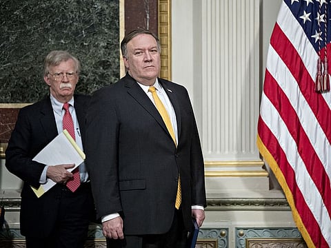 John Bolton, national security advisor (left) and Mike Pompeo, secretary of state, in the Indian Treaty Room of the Eisenhower Executive Office Building in Washington on Oct. 11, 2018.
