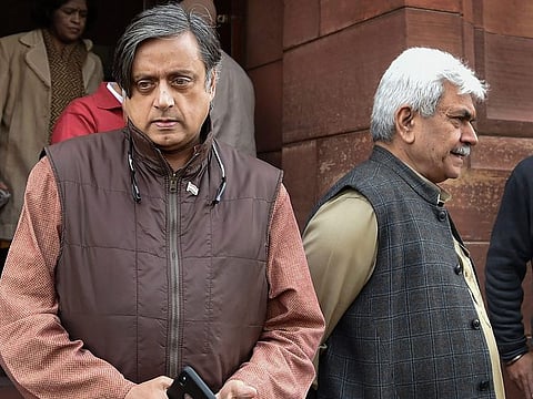 Congress MP Shashi Tharoor (left) is seen during the Winter Session of Parliament, in New Delhi, Thursday, December 27, 2018.
