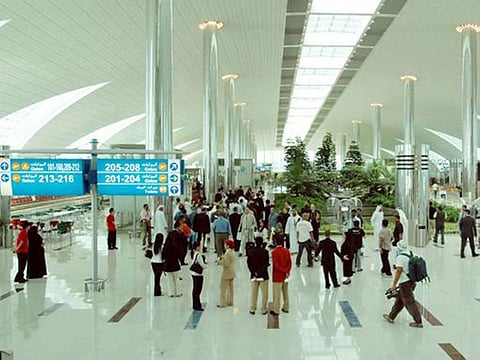 Passengers at Dubai International Airport.