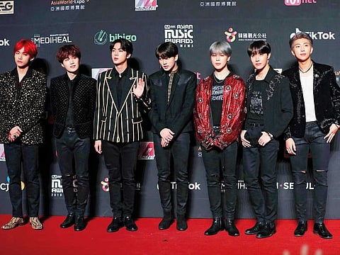 BTS members V, Suga, Jin, Jungkook, Jimin, J-Hope and RM.