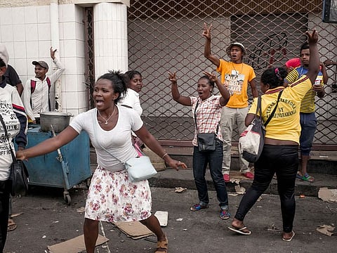 Supporters of Malagasy presidential candidate Andry Rajoelina fight with supporters of candidate Marc Ravalomanana in Antananarivo on January 5, 2019.