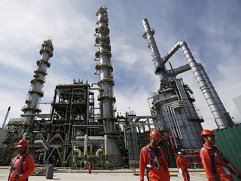 File photo: Employees walk at Mexico's national oil company Pemex's refinery in Salamanca, in Guanajuato state, Mexico.