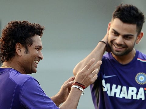 Sachin Tendulkar with Virat Kohli.