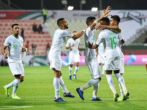 Players of Saudi Arabia celebrate after scoring the second goal playing against DPR Korea, during the AFC Asian Cup 2019 at Rashid Stadium, Dubai. 8th January 2019.