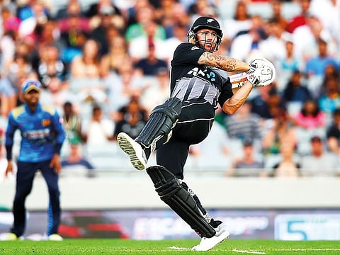 Doug Bracewell of New Zealand hits a shot during the twenty20 international cricket match between New Zealand and Sri Lanka at Eden Park in Auckland on January 11, 2019.