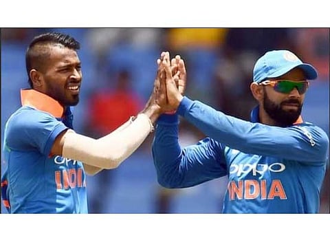 India captain Virat Kohli (right) says his players do not support "inappropriate" comments made by team-mates Hardik Pandya and KL Rahul about women.