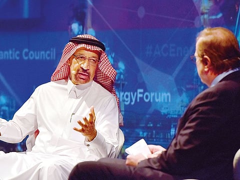 Khalid Al Falih speaks Gen James L Jones Jr of the Atlantic Council on the second day of the Atlantic Council Global Energy Forum in Abu Dhabi on Sunday.