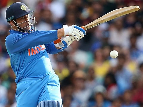 India's M.S. Dhoni drives the ball against Australia during their one day international cricket match in Sydney, Saturday, January 12, 2019.